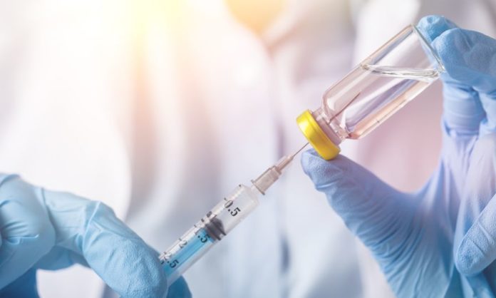 93376427 - injecting injection vaccine medicine flu