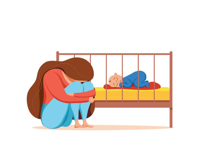 Illustration d'une femme dépressive à côté d'un lit d'enfant